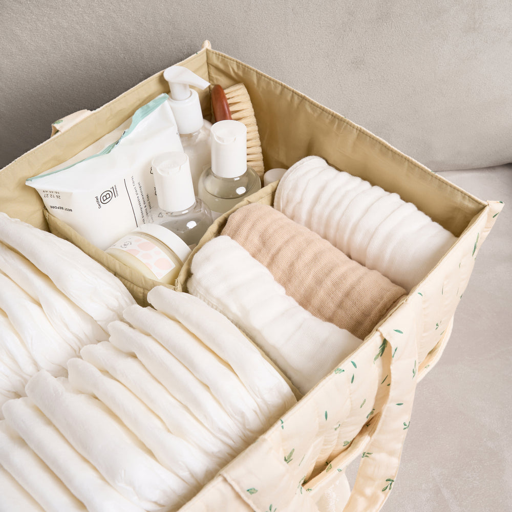 Linen Leaf nappy caddy holding nappies, wipes and baby essentials